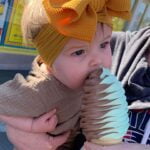 very-young-girl-licking-a-big-ice-cream-cone