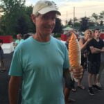 smiling-man-with-large-ice-cream-cone